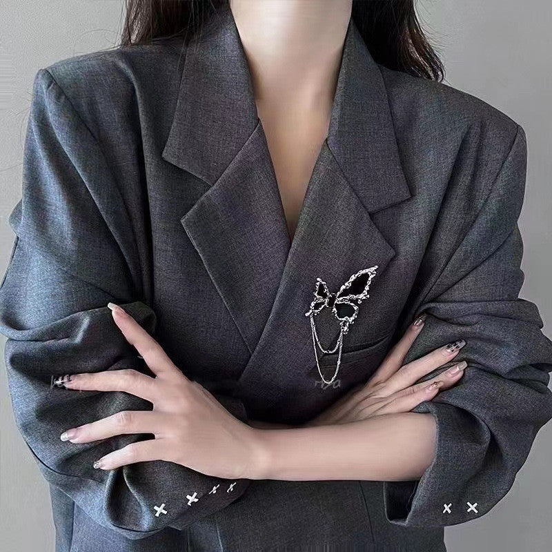 Broche con borlas de mariposa negro para mujer