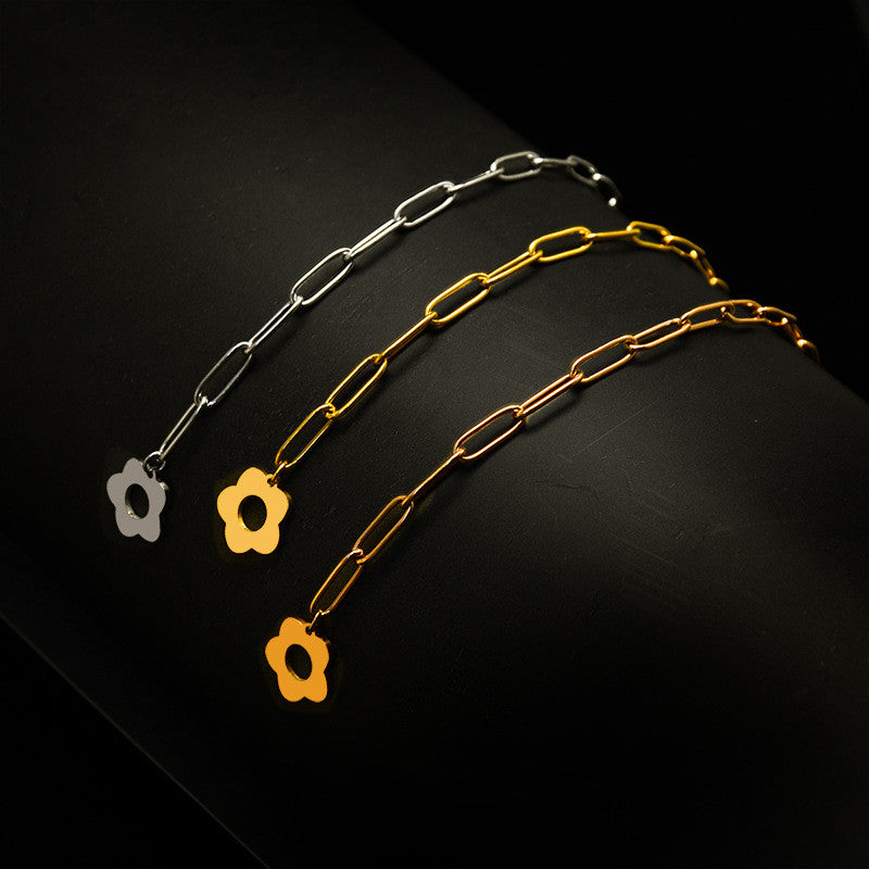 Pulsera versátil de acero de titanio chapado en oro de 18 quilates E124