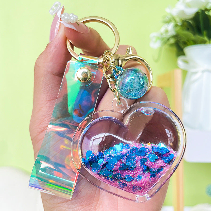 Llavero de corazón de arenas movedizas de aceite creativo
