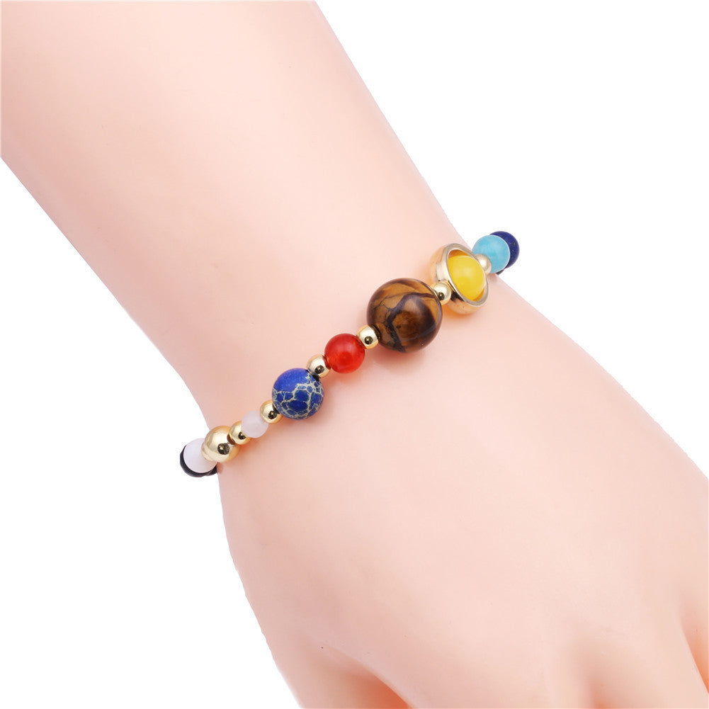 Acht Planetenarmbänder
