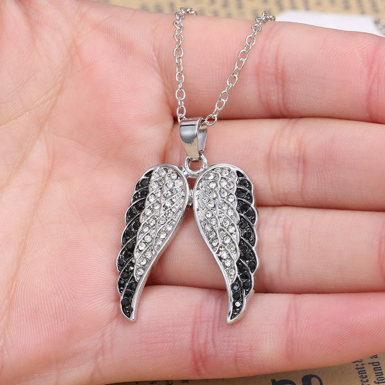 Rhinestone wing necklace