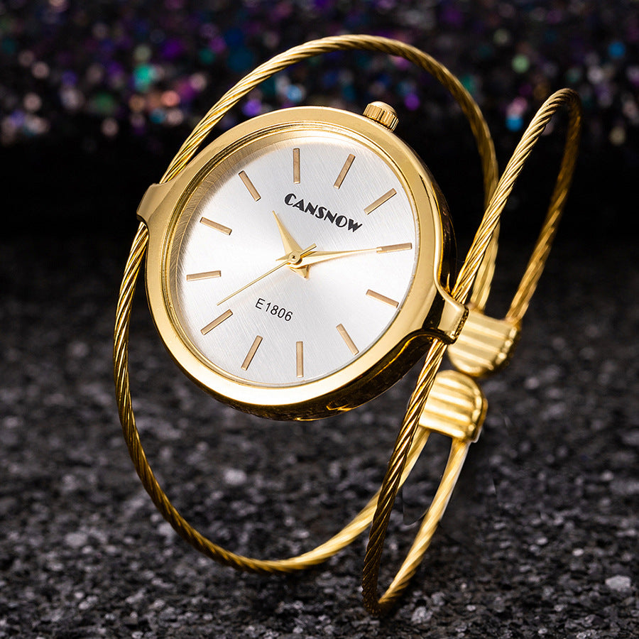 Reloj de pulsera de alambre de acero para mujer con diseño sencillo de cielo estrellado
