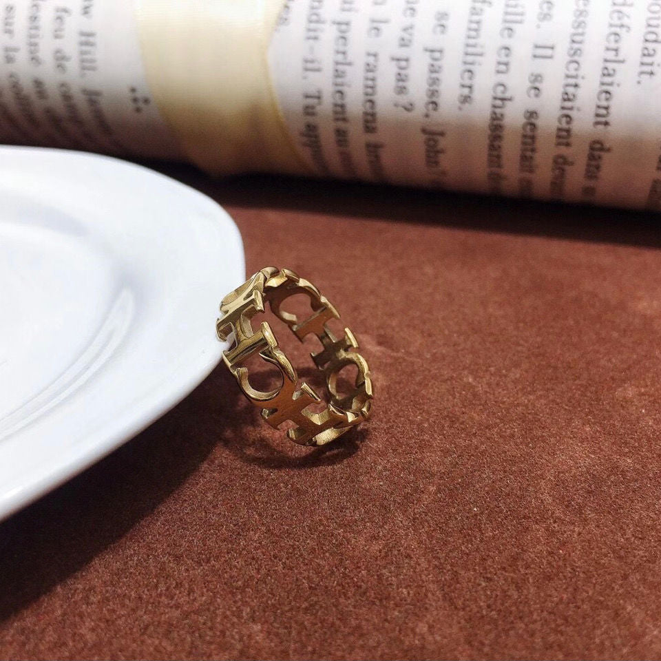 Anillo de acero inoxidable calado con letras para hombre y mujer, joyería de alta calidad