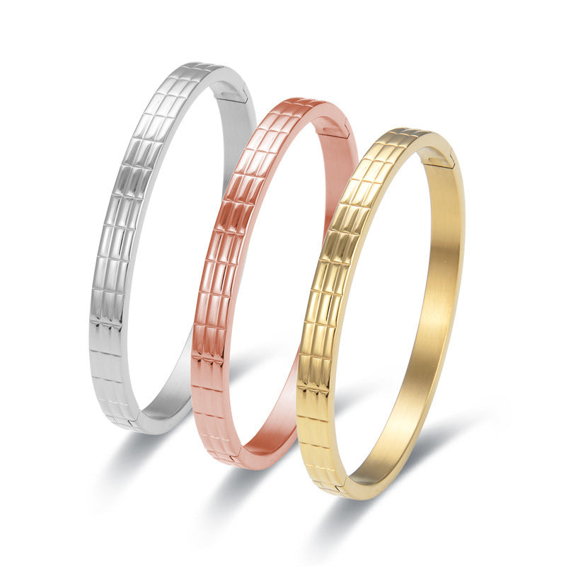 Brazalete de oro y plata de acero de titanio rosa