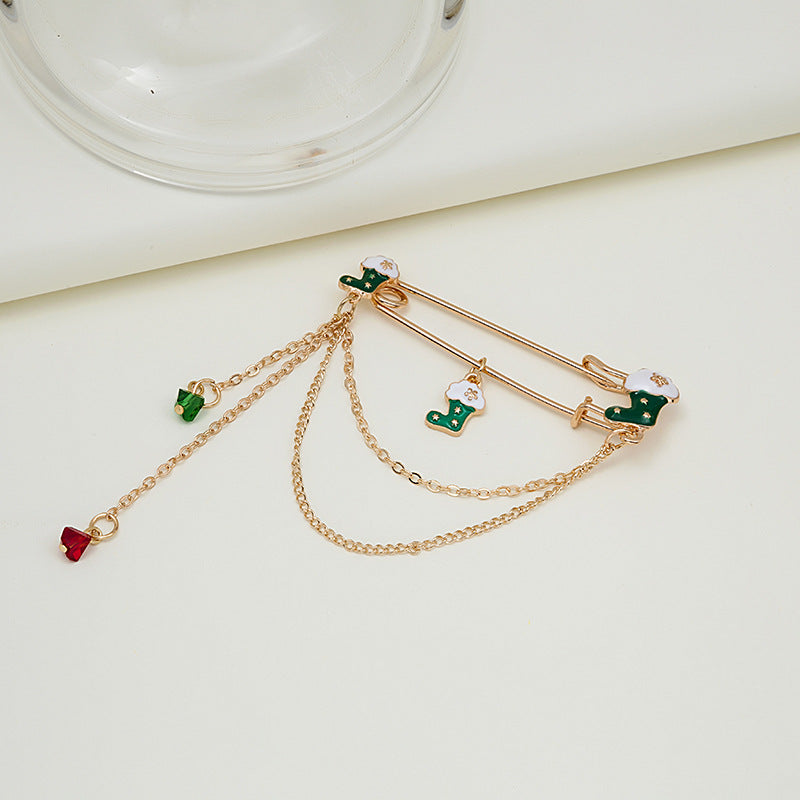 Broche de moda con cadena y cascabel