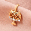 Anillo de nariz falso con diseño de corona de corazón minilindo y corona dorada
