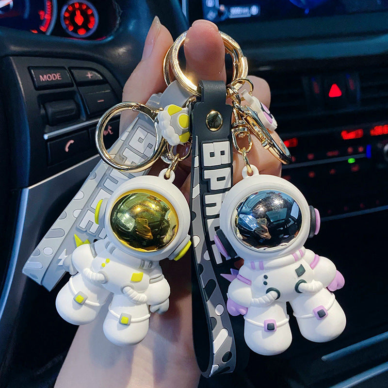 Cartoon cooler Astronaut tropft zarter Schlüsselanhänger