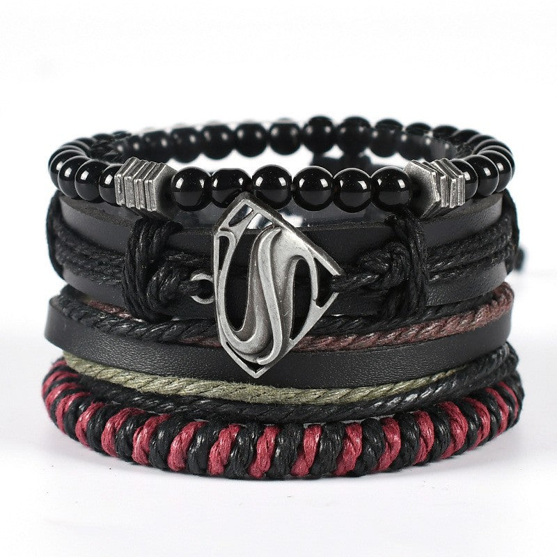 Geflochtenes Lederarmband mit mehreren Lagen und Flügelanhänger