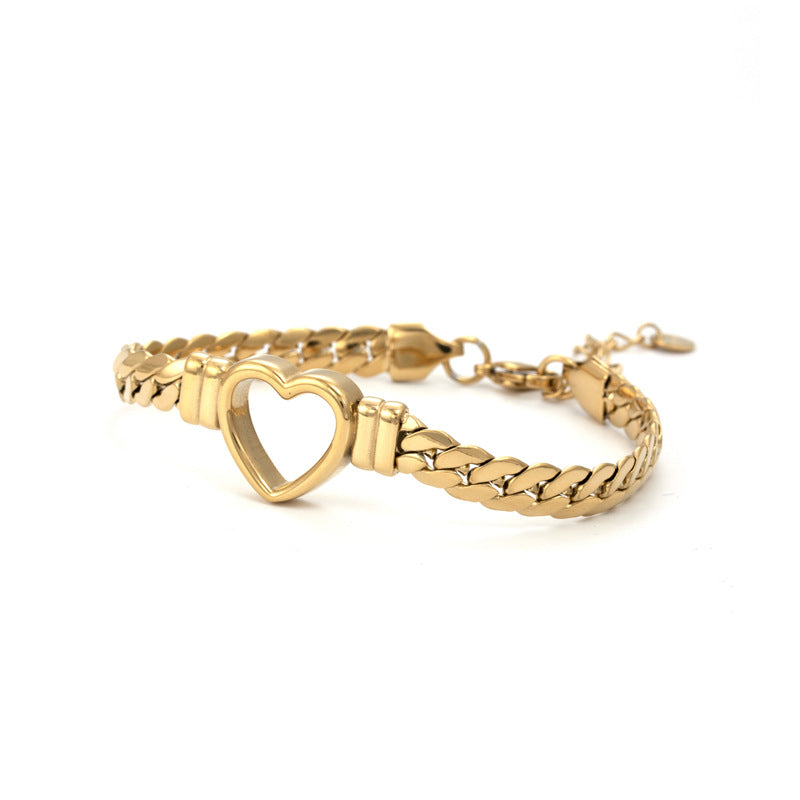 Pulsera de acero de titanio con corazón hueco, sencilla y a la moda
