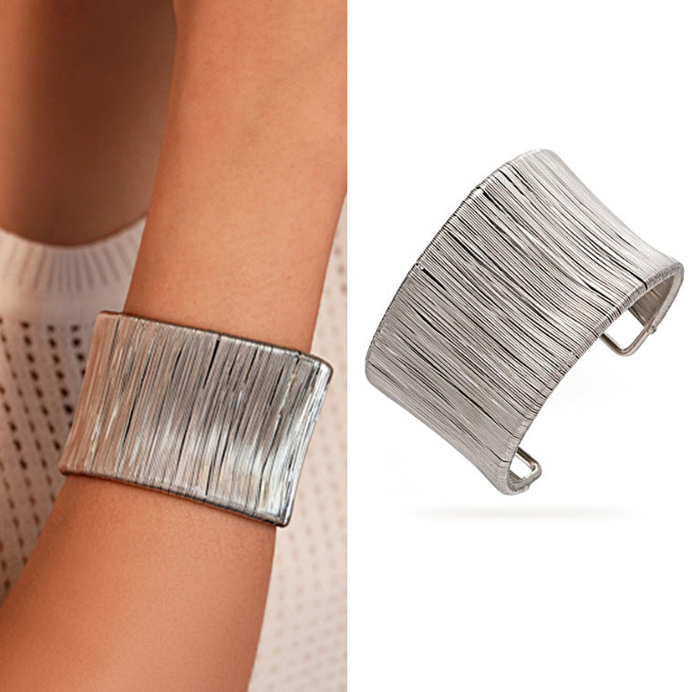 Handcrafted Gold-plated Geometric Cuff Bracelets And Boho-chic Metal Tassel Arm Rings With Vintage-inspired Exaggerated Water Drop Designs, Offering Unisex Luxury Accessories In Open Bangle Styles