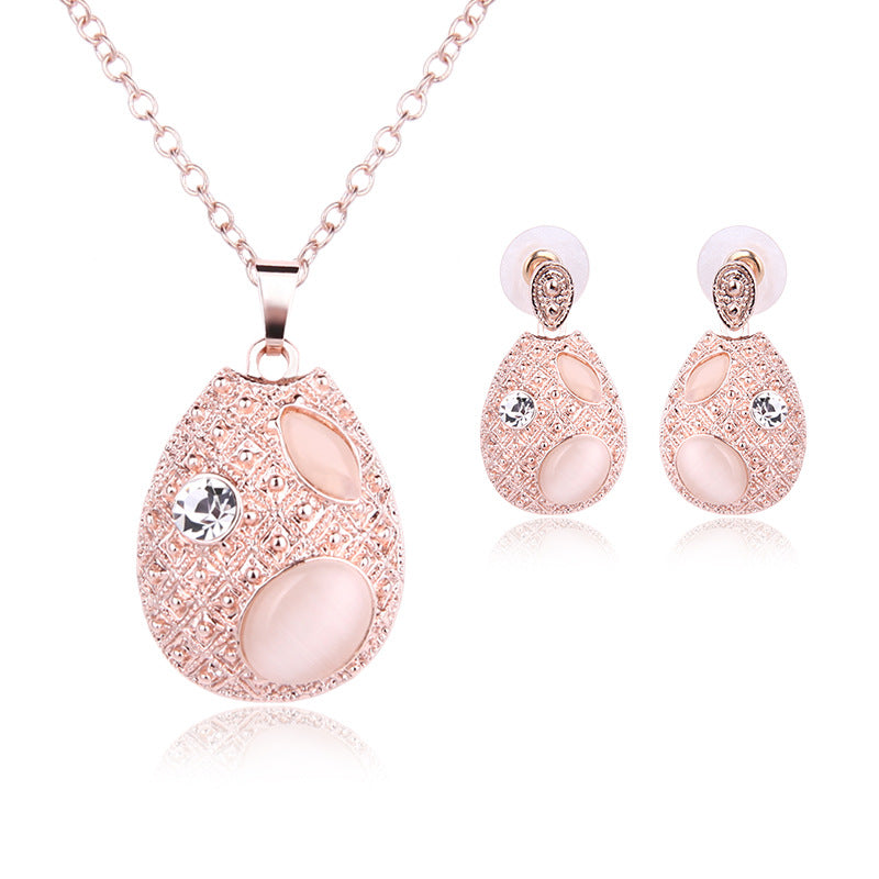 Zweiteiliges Schmuckset aus ovaler Opal-Halskette und Ohrringen