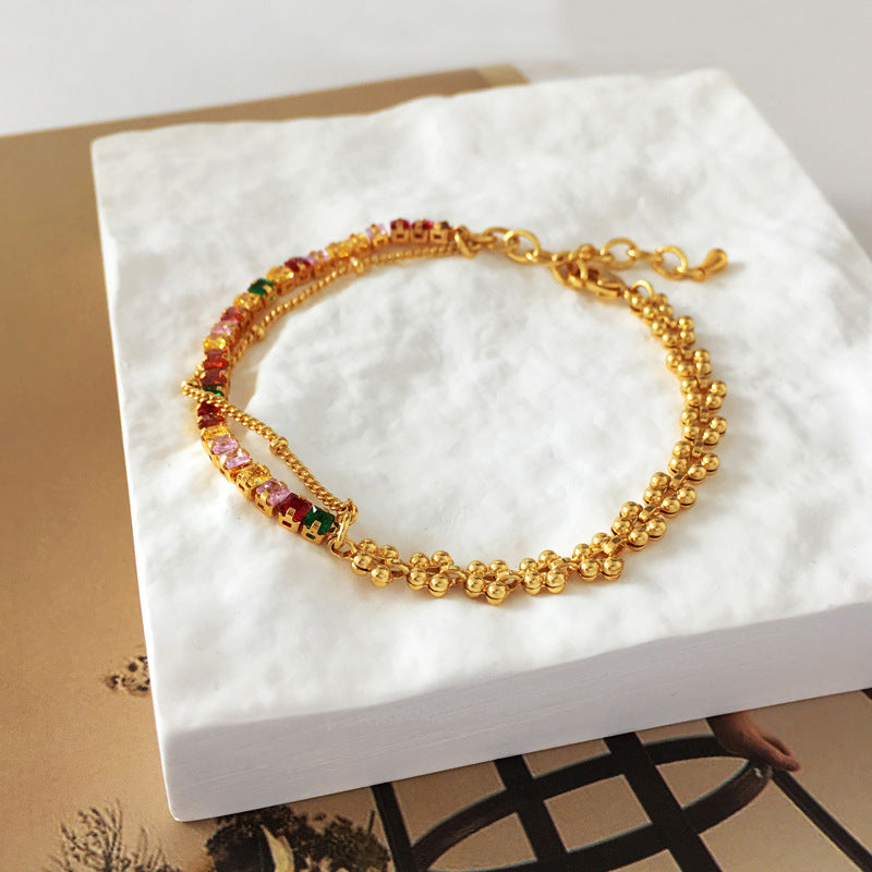 Pulsera multicapa de estilo retro con baño de cobre y oro y diseño de retales