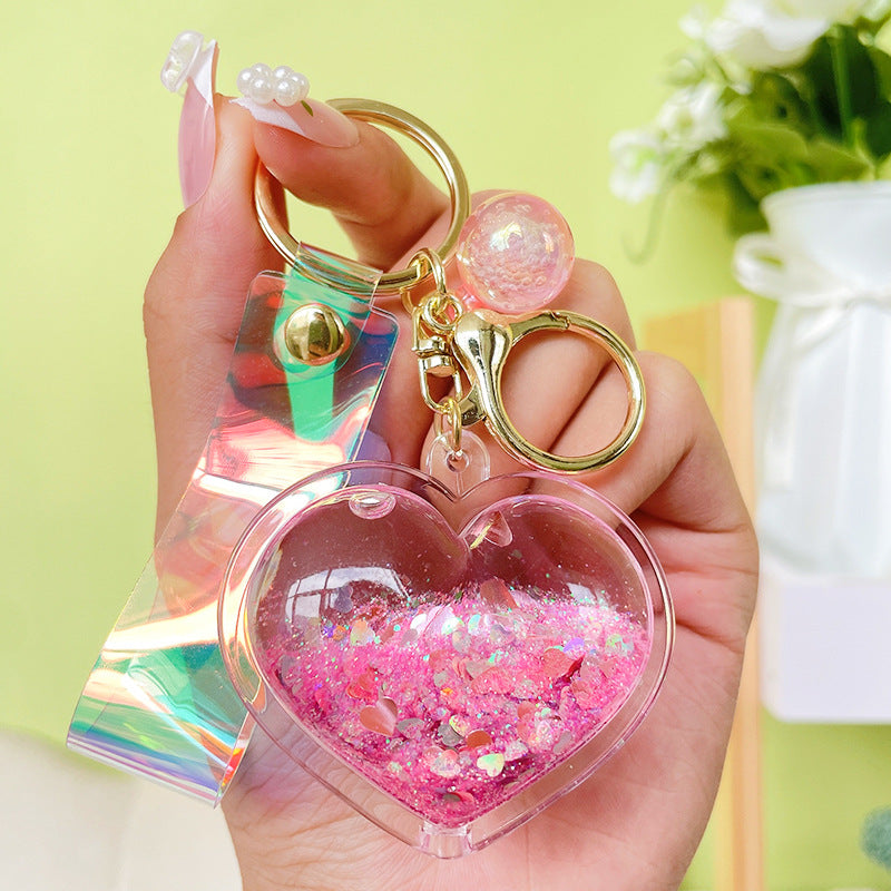 Llavero de corazón de arenas movedizas de aceite creativo