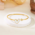 Pulsera Corazón de Aceite Hueco con Diamante