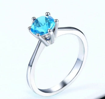 Anillo de oro rosado y circonita