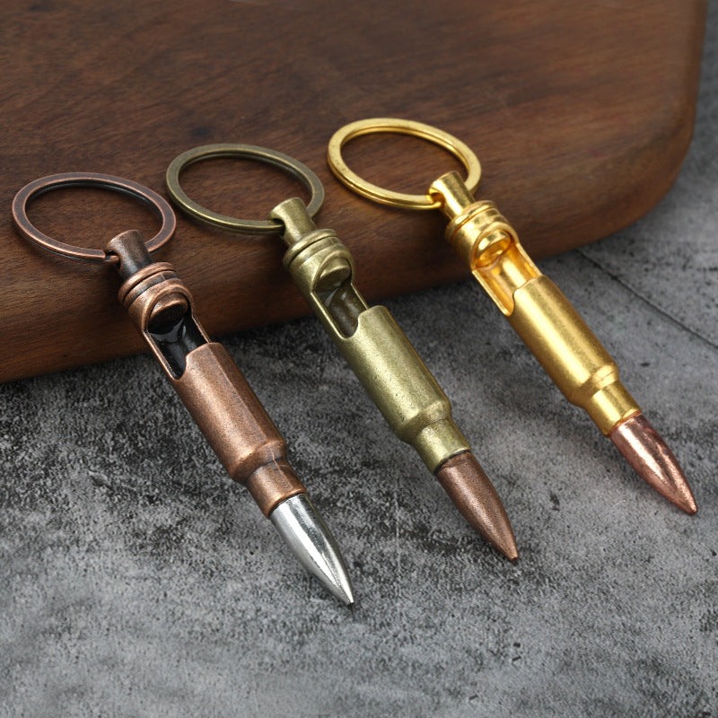 Llaveros de metal con abrebotellas tipo bala, colgante creativo