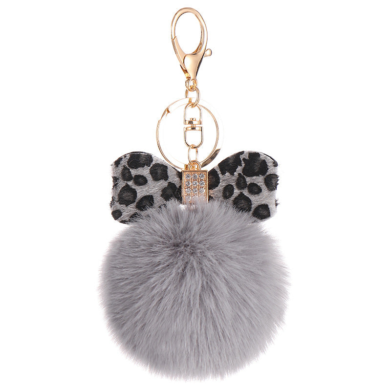 Llavero Colgante para Mochila con Bola de Pelo y Lazo de Leopardo