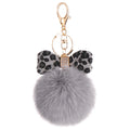 Llavero Colgante para Mochila con Bola de Pelo y Lazo de Leopardo