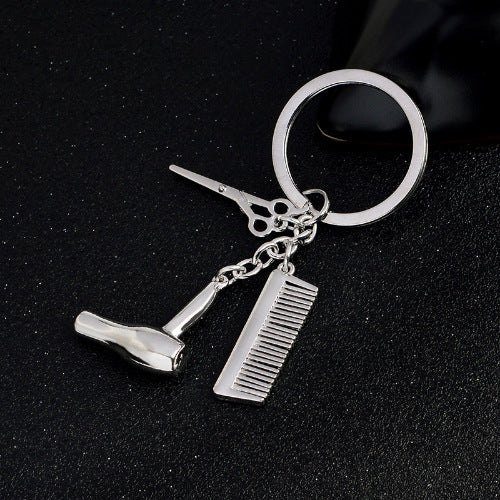Europäische und amerikanische Schmuckmode Friseur Friseurwerkzeuge Gold- und Silberlegierung Herren- und Damen-Geschenk Schlüsselanhänger Großhandel