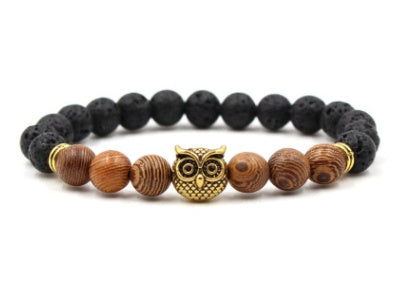 Außenhandel AliExpress meistverkaufte 8mm Naturstein schwarzer Lavavulkanstein Armband Goldlegierung Eule Armband