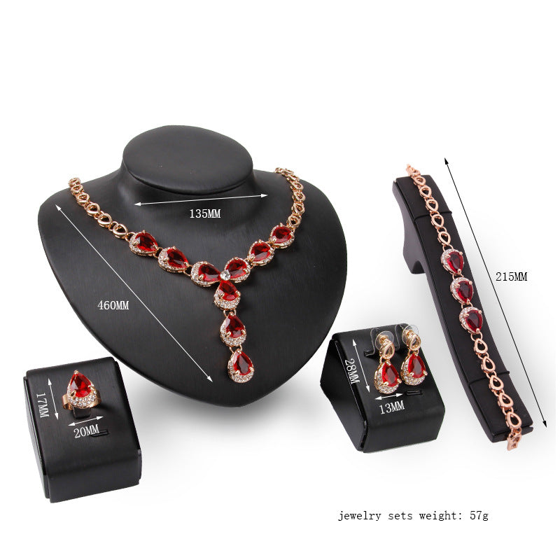 Charmantes rotes Edelstein-Schmuckset vierteilig Europäische und amerikanische Hochzeitsaccessoires