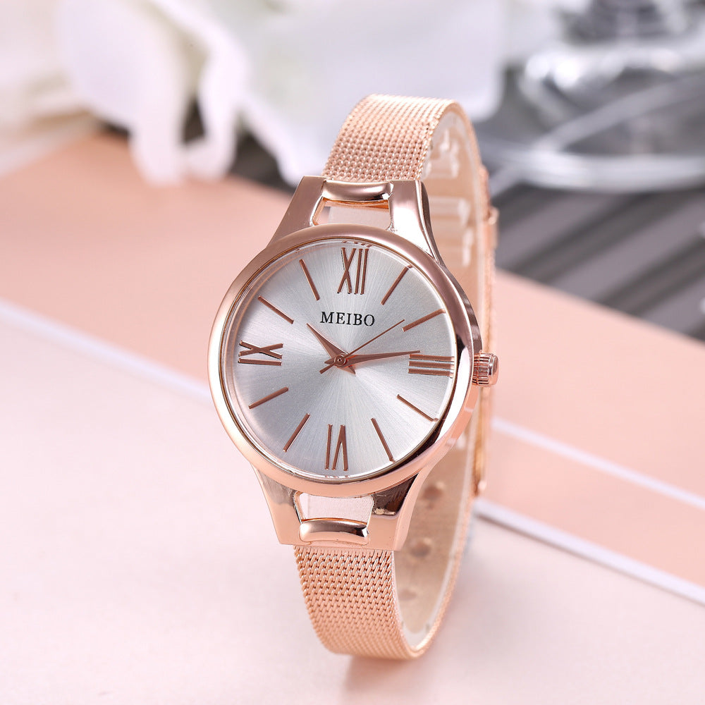 Reloj de malla de acero inoxidable en oro rosa con esfera redonda, hebilla de pasador y cristal, modelo Harmony Sale, para mujer