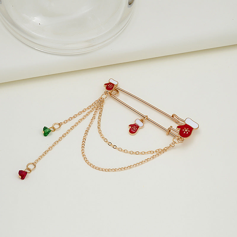 Broche de moda con cadena y cascabel