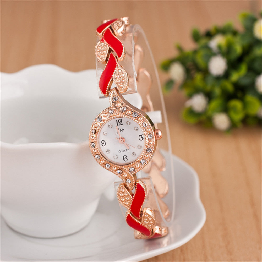 Reloj de pulsera de cuarzo con hojas