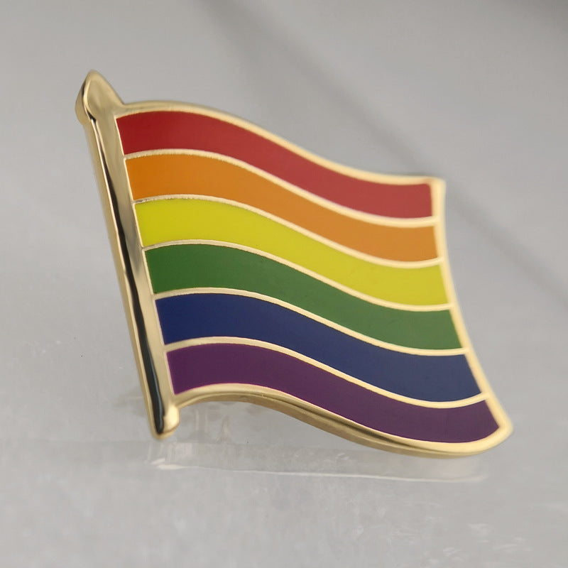 Metal rainbow badge