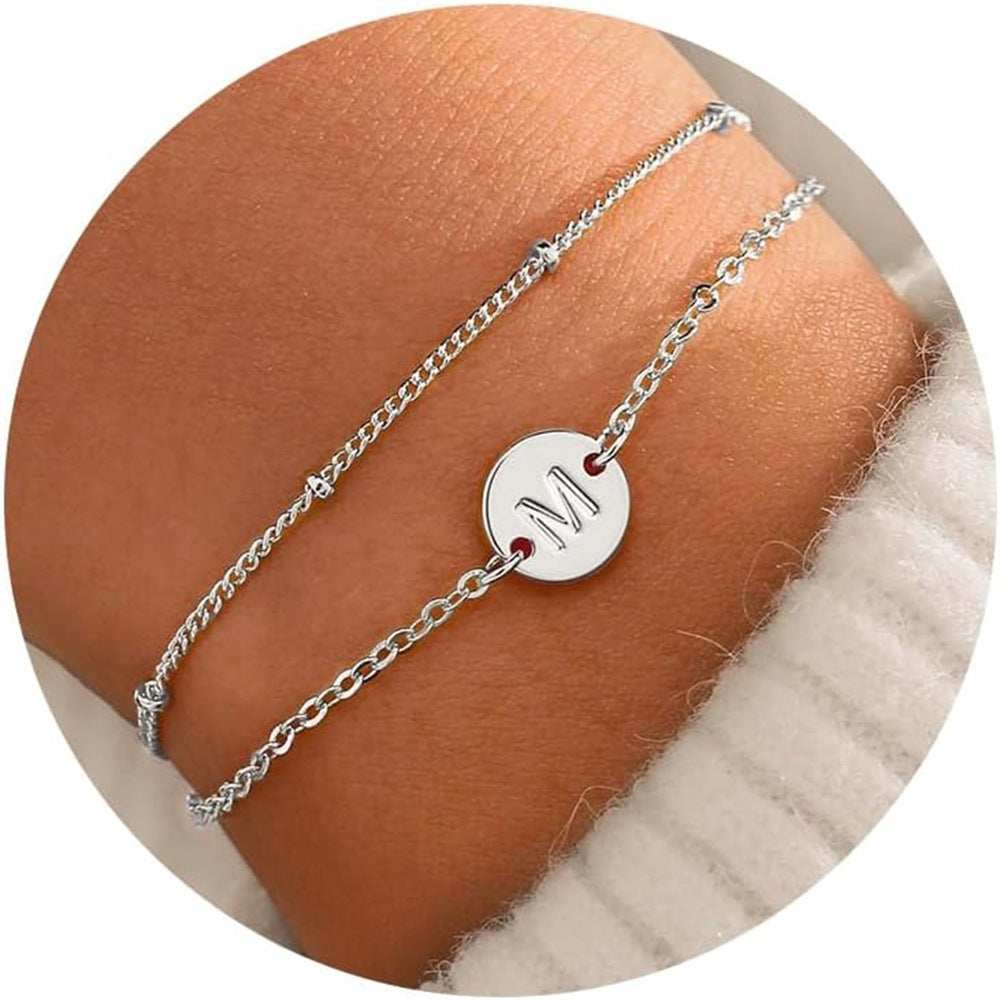 Pulsera doble capa de letras redondas plateadas, de acero inoxidable para mujer, con cuentas pequeñas en forma de arroz, en capas
