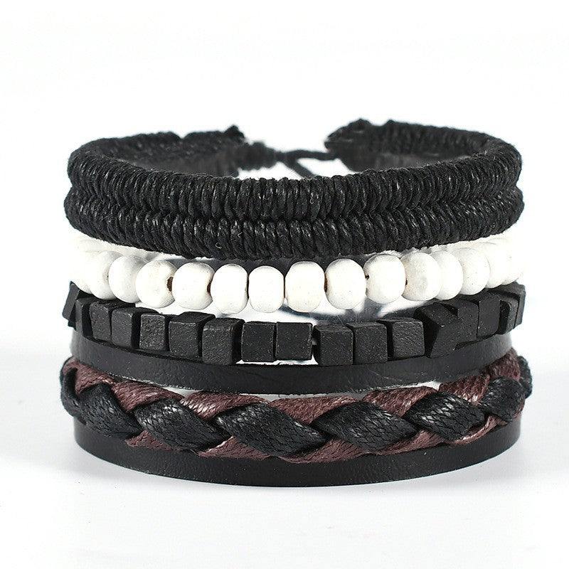 Geflochtenes Lederarmband mit mehreren Lagen und Flügelanhänger