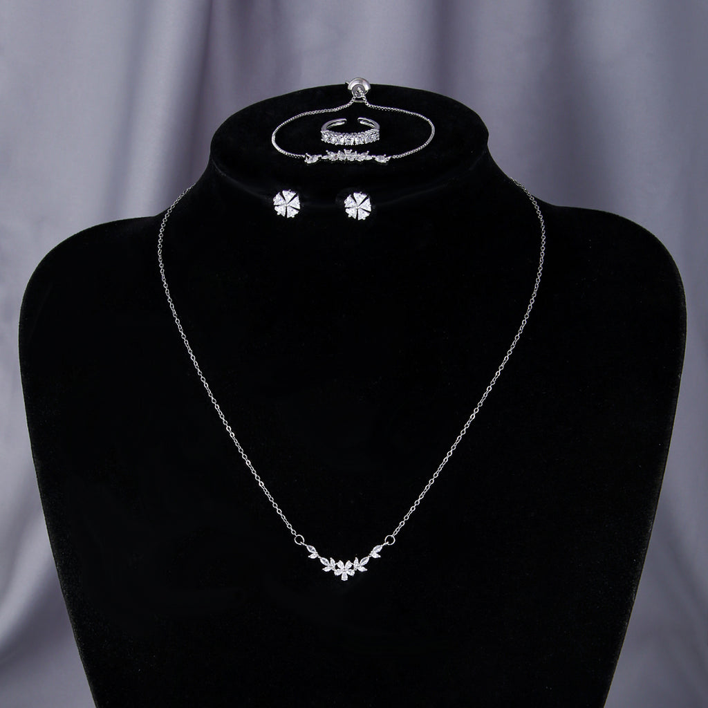 Schlichtes, elegantes Zirkon-Schmuckset, silberne Blumenkette, exquisite Ohrringe, Armband, Ring, geeignet für den täglichen Gebrauch von Frauen im Urlaub