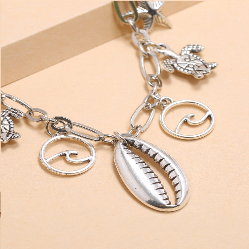 Tobillera con colgante de estrella de mar, ola, concha y tortuga, de la serie Beach Ocean
