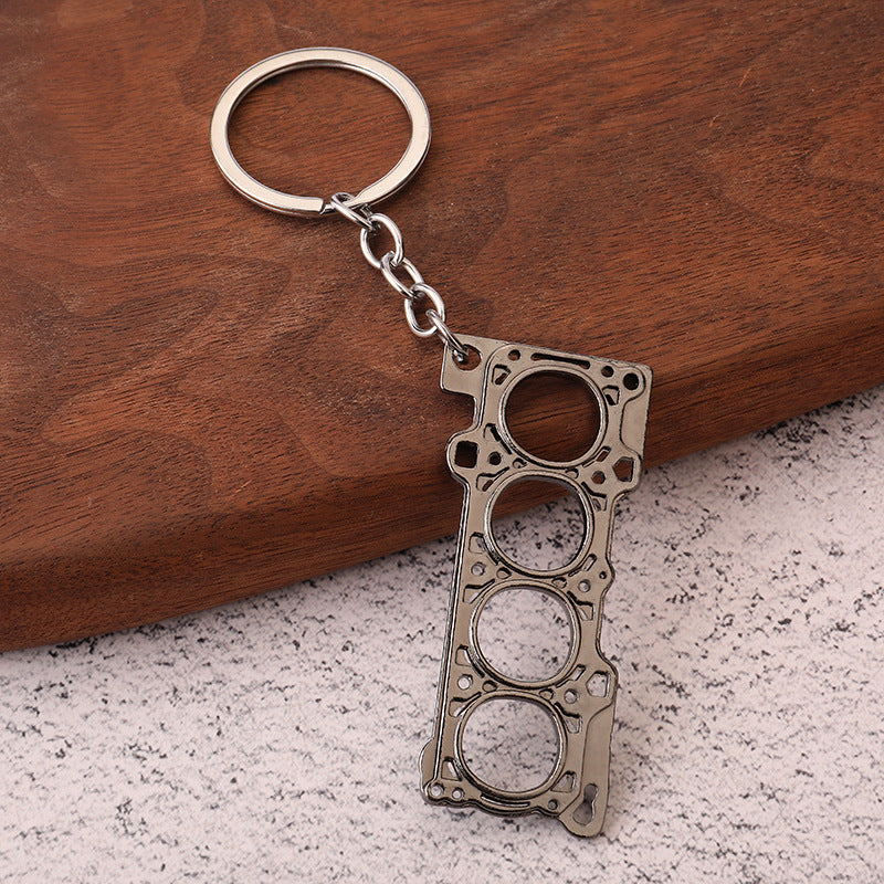 Llavero de asiento, creativo, de metal, para coche