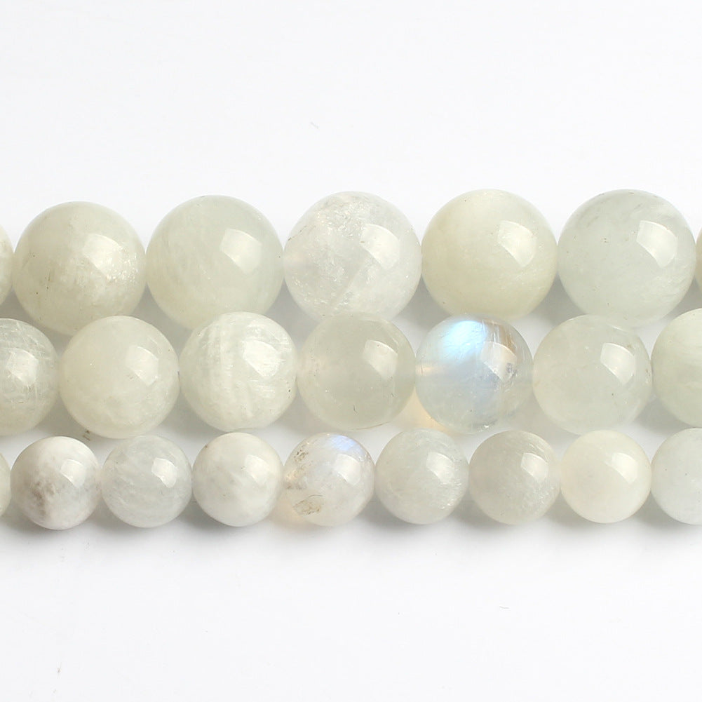 Accesorios de joyería de cuentas de piedra lunar azul blanca