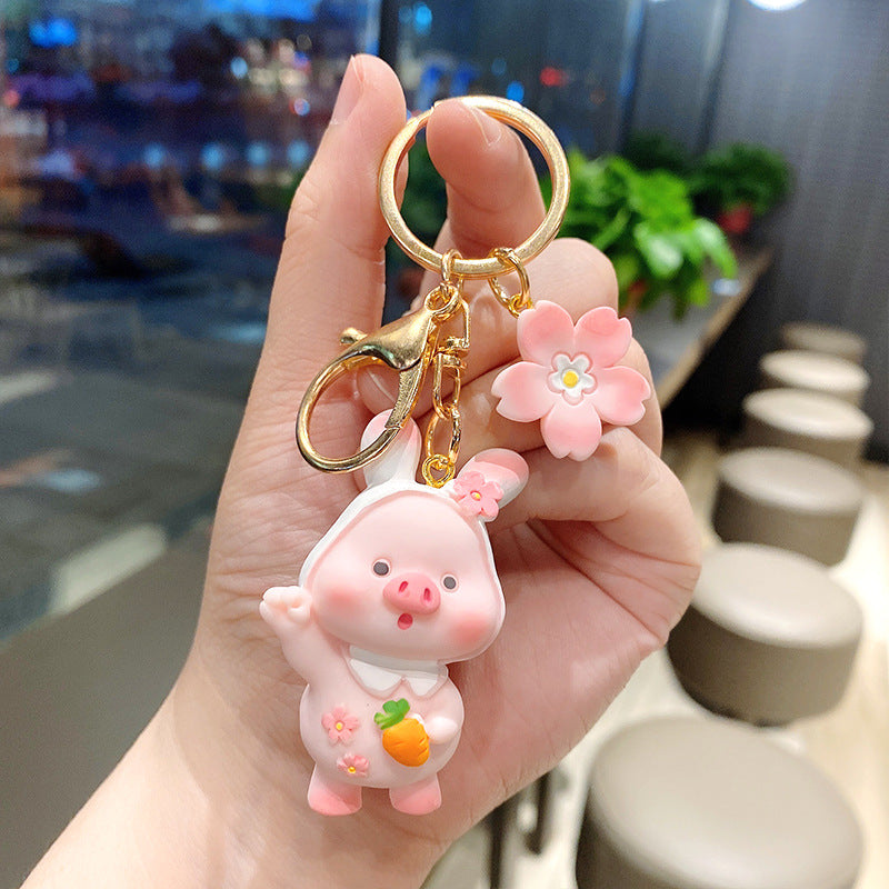 Llavero creativo con personalidad de cerdito de flor de cerezo