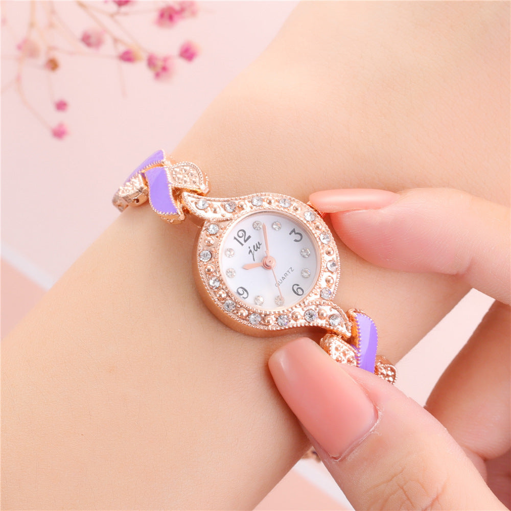 Reloj de pulsera de cuarzo con hojas