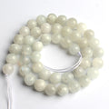 Accesorios de joyería de cuentas de piedra lunar azul blanca