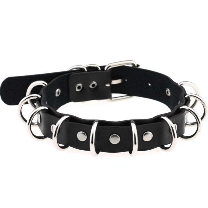 Collar doble de cuero estilo punk exagerado con múltiples aros metálicos