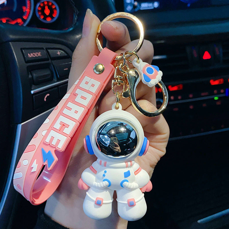 Cartoon cooler Astronaut tropft zarter Schlüsselanhänger
