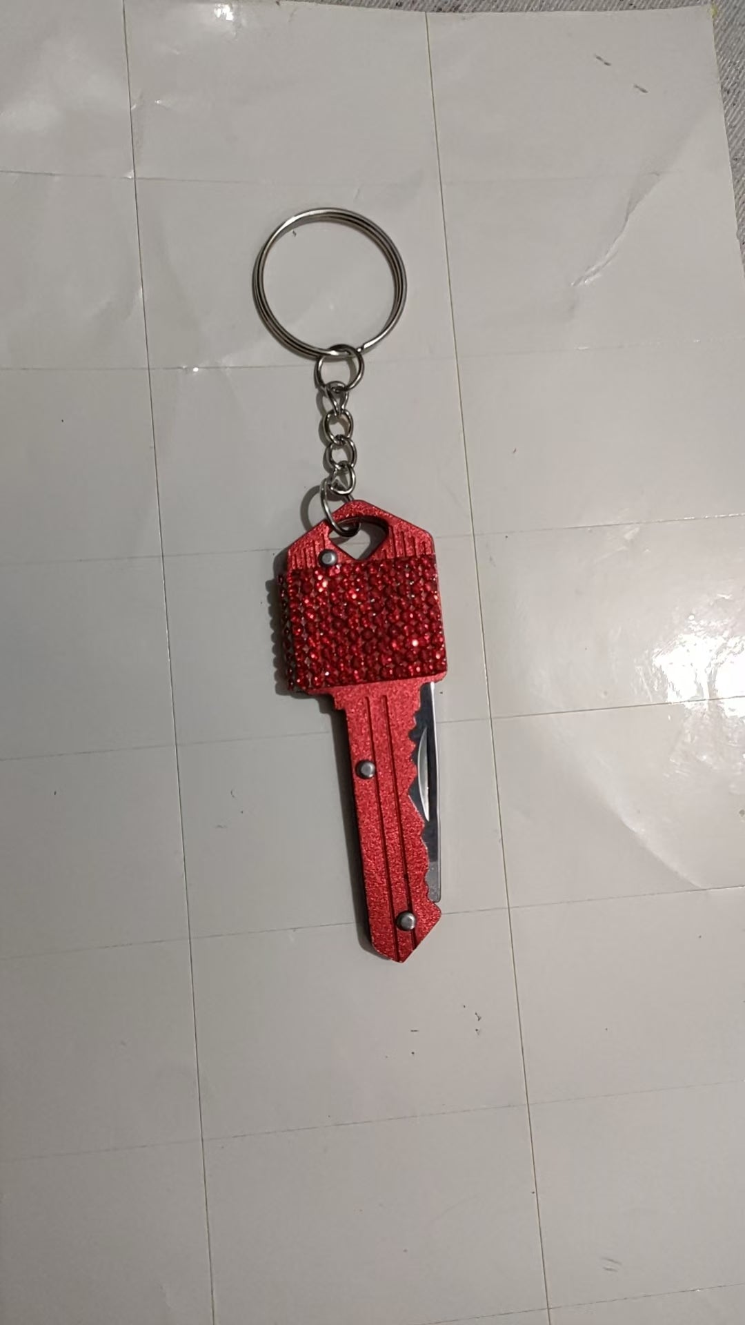 Colgante con mini navaja multiusos EDC