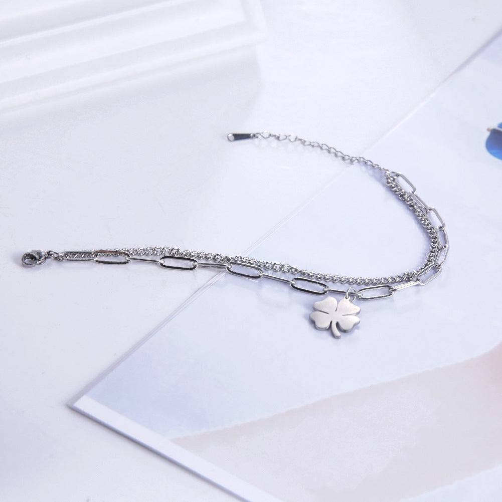 Damenarmband aus Edelstahl mit klassischem vierblättrigem Kleeblatt-Anhänger