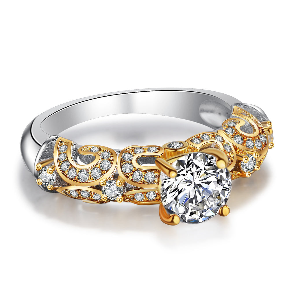 Anillo con gema de simulación engastada con cuatro garras