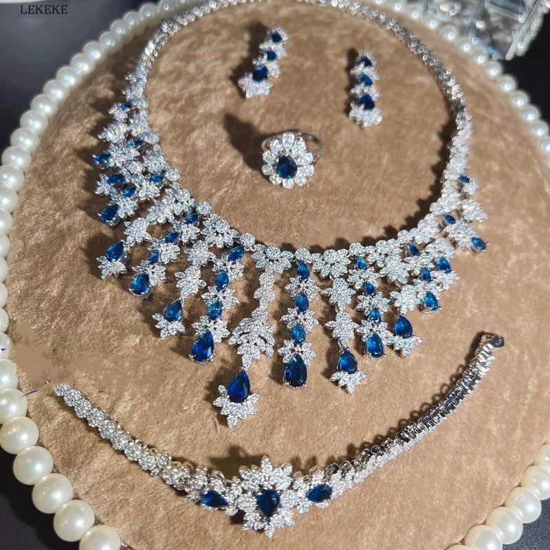 Blaues Strass-Zirkon-Quasten-Halsketten-Ohrring-Armband-Vierteiliges Set