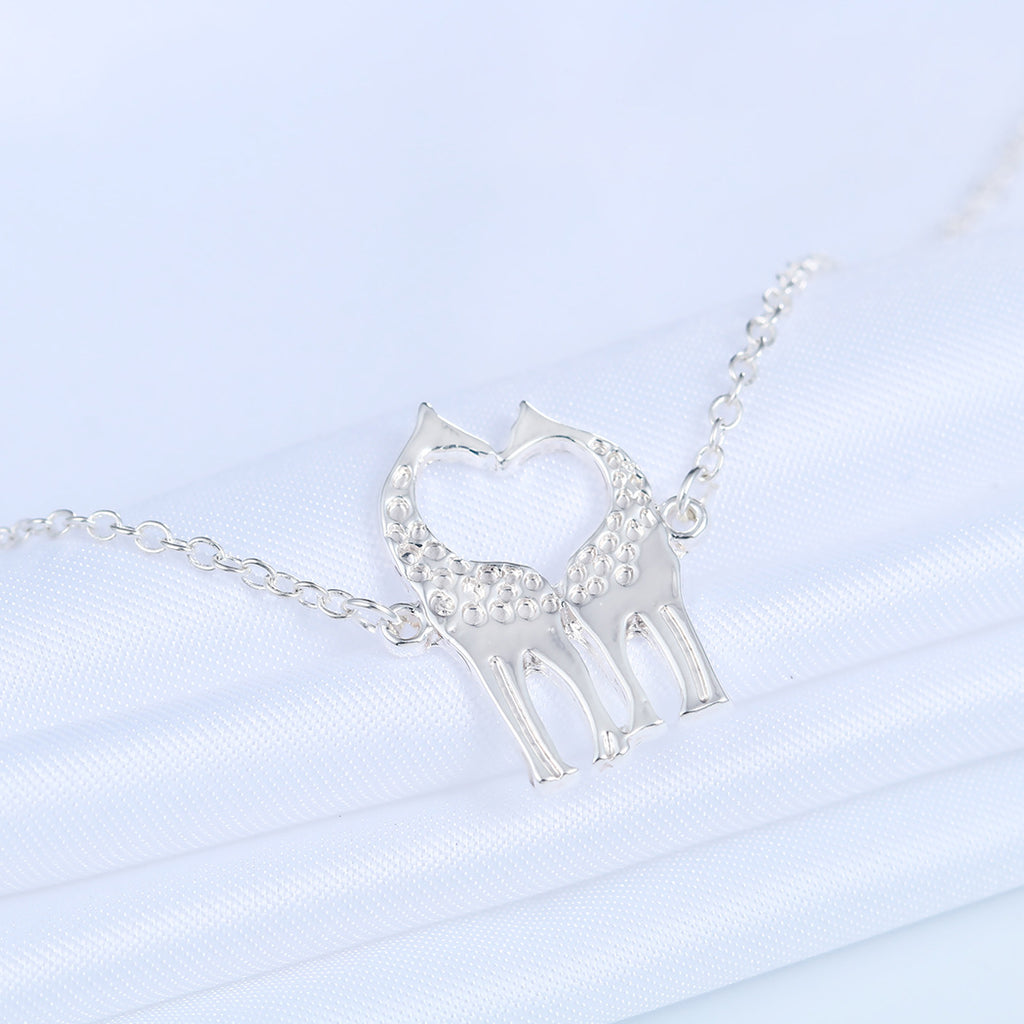 Vergoldete Silberarmbänder mit Liebesherz-Giraffen