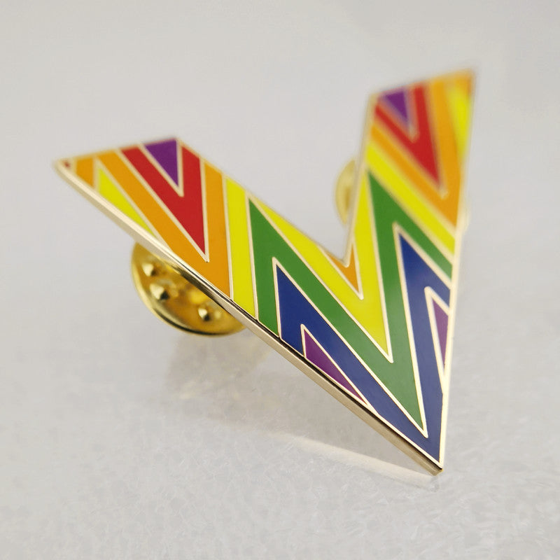 Metal rainbow badge