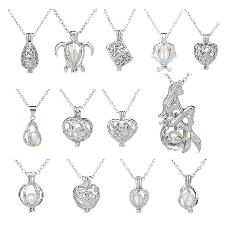 Fabricante al por mayor de collares de perlas de ostras huecas creativas, accesorios de cadena de clavícula de perlas de agua dulce naturales.