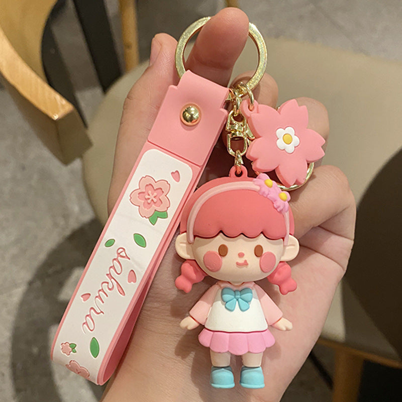 Nuevos Llaveros con Diseño de Muñeca de Niña con Flores de Cerezo