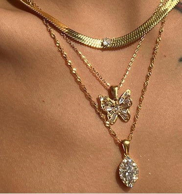 Collar de acero titanio con circonita ojo de caballo en forma de aceituna y perforación completa