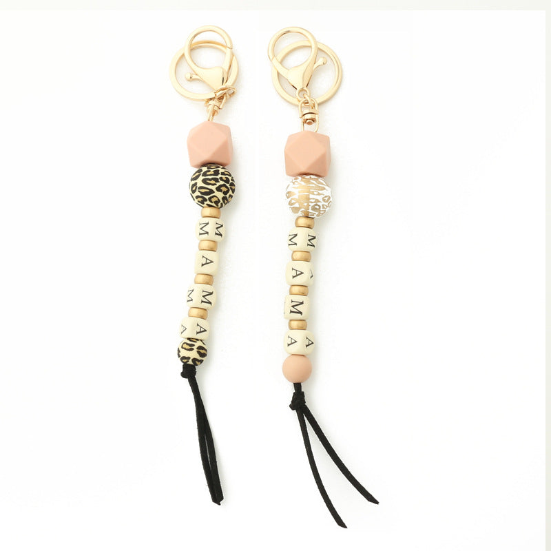 Llavero de cadena de leopardo con colgante de silicona con letras de madera y oblea
